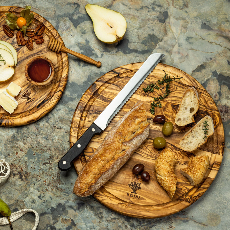 Round cutting board with juice groove "THE RIESENRAD