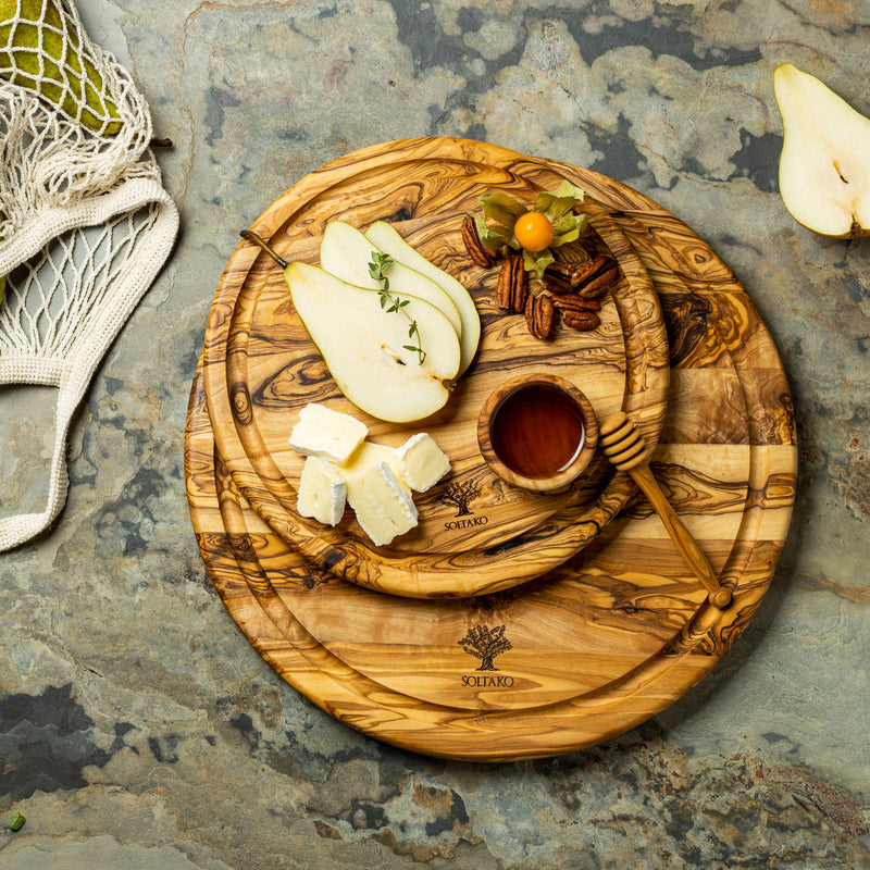 Round cutting board with juice groove "THE RIESENRAD