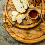 Round cutting board with juice groove "THE RIESENRAD